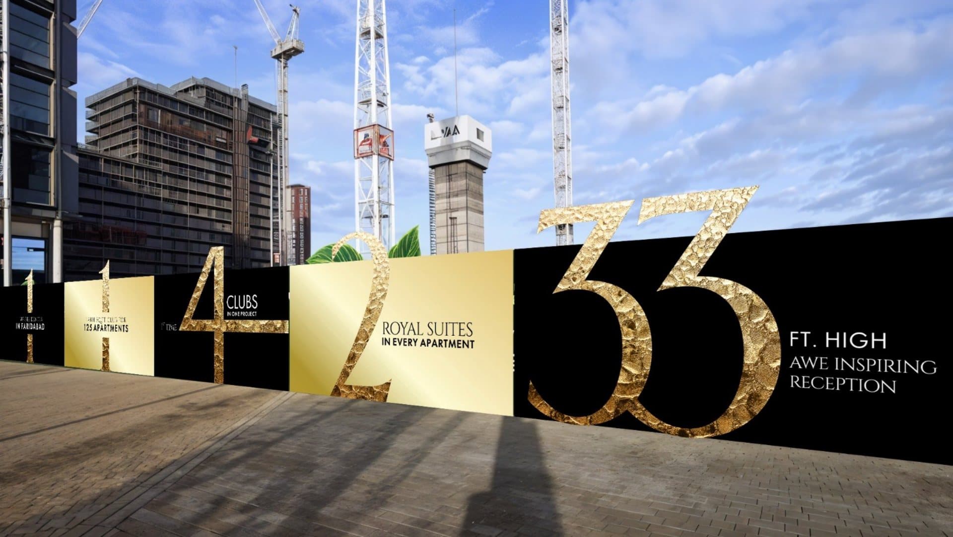 Construction site barricade with oversized gold numerals 1, 4, 2 and 33